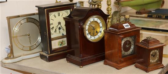 A collection of five various clocks